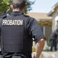 male probation officer in the street