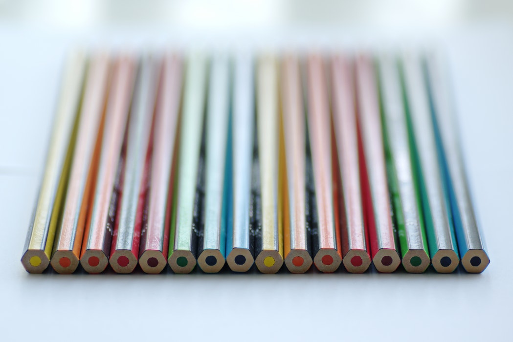 color pencil piled on white panel